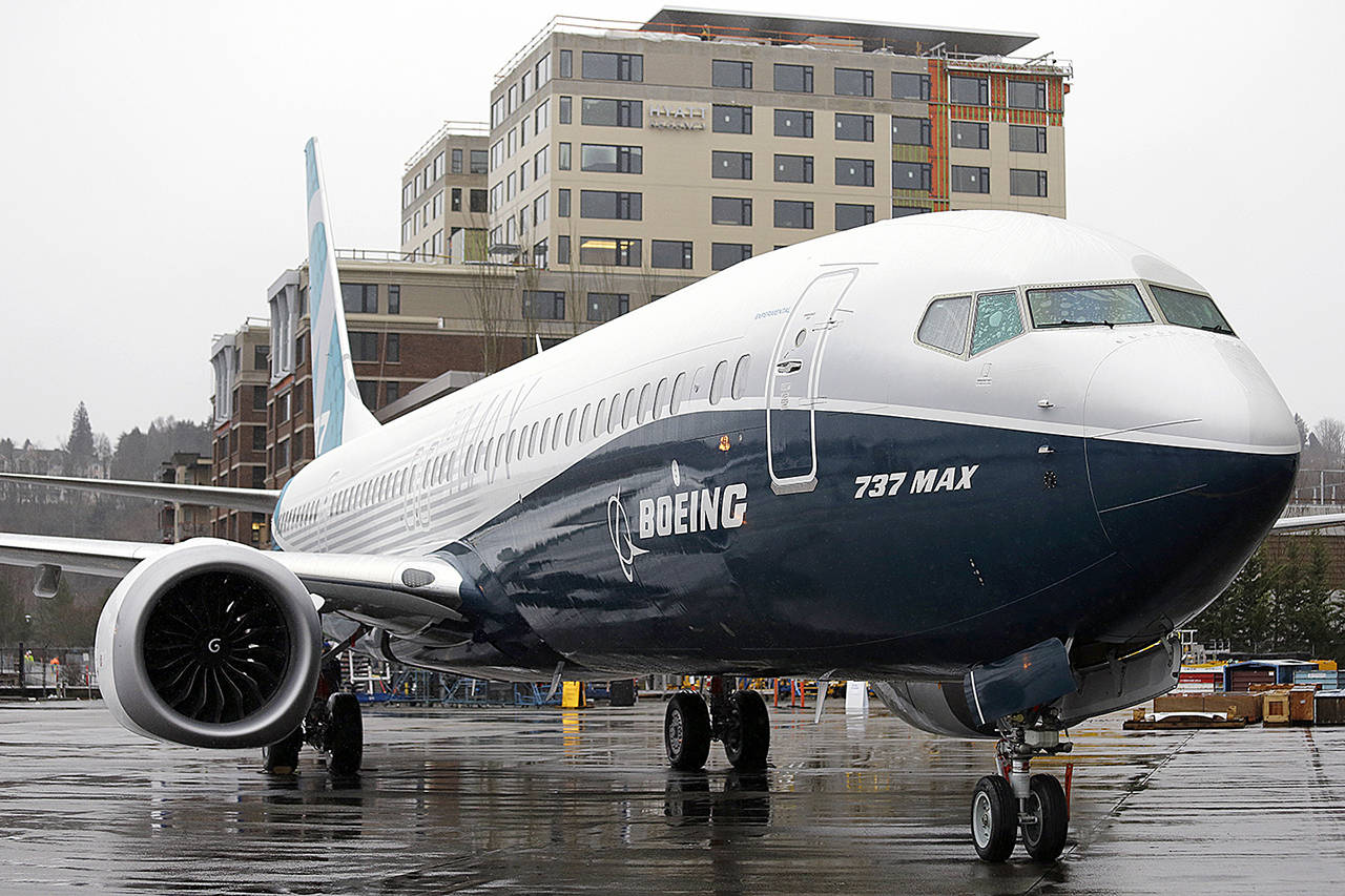 The first of the large Boeing 737 MAX 9 models, Boeing’s newest commercial airplane, sits outside its production plant Tuesday, March 7, in Renton. Boeing has already built 13 of the initial MAX 8 models, which are awaiting FAA certification and plans to deliver its first 737 MAX airplane by May. (AP Photo/Elaine Thompson)