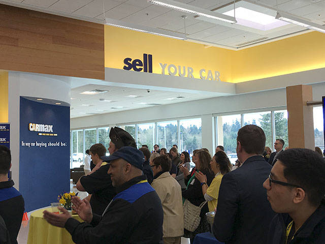 About 100 people showed up at festivities on Thursday at the Lynnwood location for CarMax, which opened this week. (Jim Davis / The Herald Business Journal)
