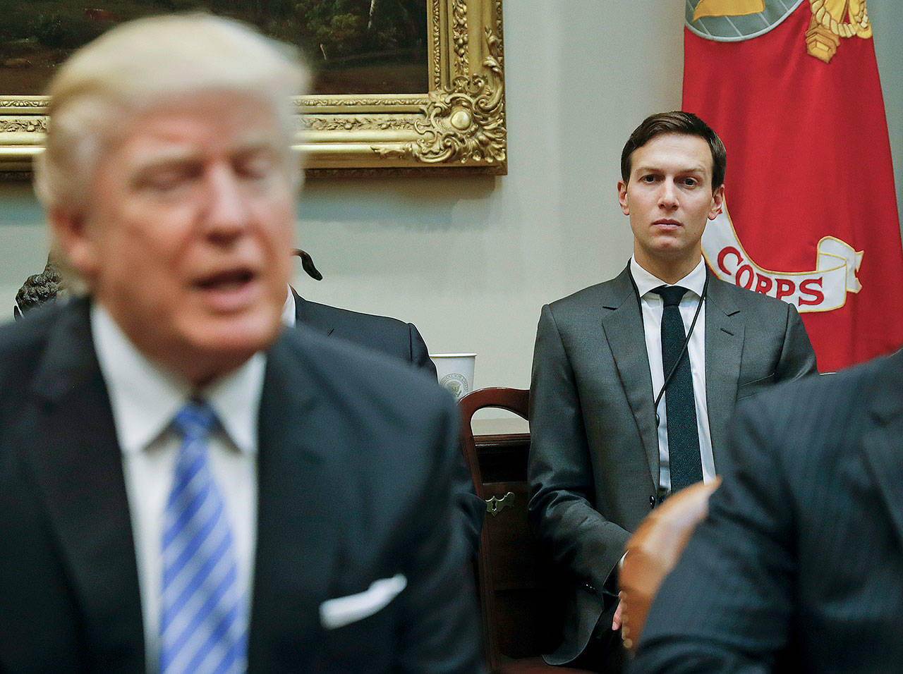 White House Senior Adviser Jared Kushner (right) listens to President Donald Trump during a breakfast with business leaders in the Roosevelt Room of the White House in Washington. (AP Photo/Pablo Martinez Monsivais, File)