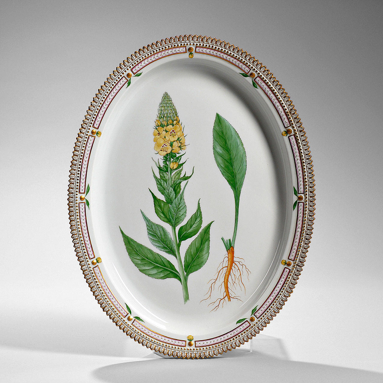 This 20th-century Flora Danica porcelain platter is 18½ inches by 14¼ inches. It features a tall, yellow mullein flower. The dish is fully marked on the bottom with factory marks and the impressed number 3520. Auction price, $984 in a Skinner Inc. auction in Massachusetts.                                (Cowles Syndicate Inc. photo)