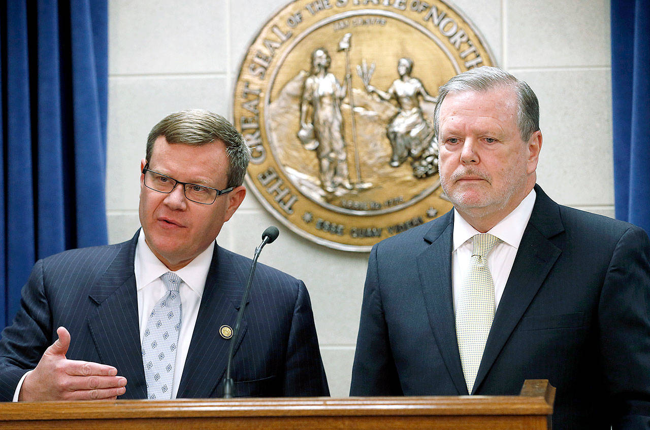 Republican state Rep. Tim Moore (left) and state Sen. Phil Berger in Raleigh, North Carolina. (Chris Seward/The News & Observer via AP, File)