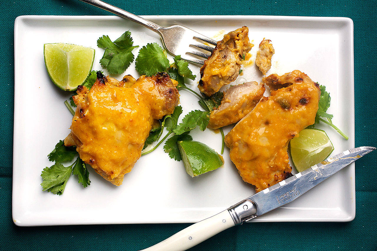 Mango-lime marinated chicken thighs marries sweet and salty, savory and spicy. (Photo by Deb Lindsey for The Washington Post)
