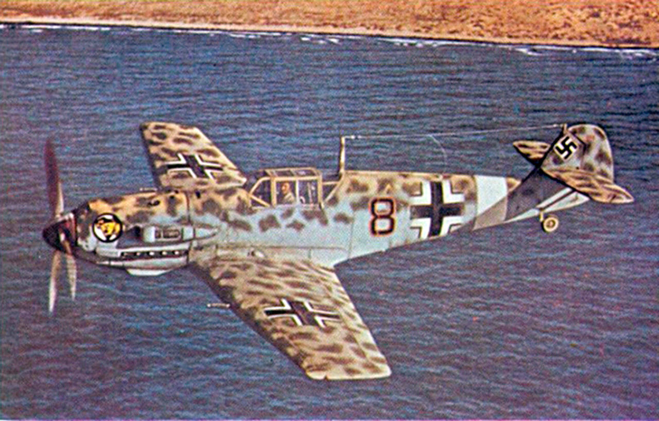 A Messerschmitt Bf 109 fighter flies near the North African coast in 1941. (Wikipedia)