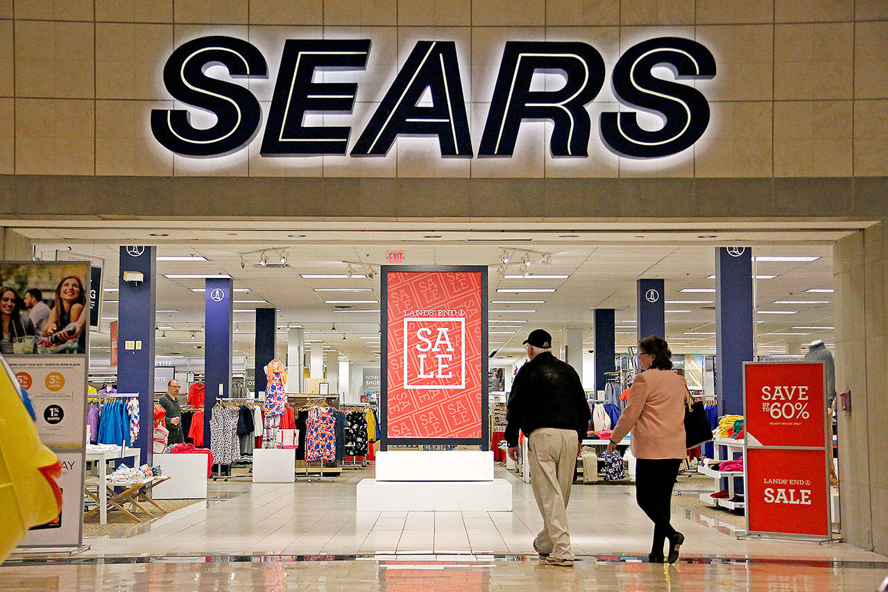 Shoppers walk into a Sears store in Pittsburgh recently. (AP Photo/Gene J. Puskar, File)