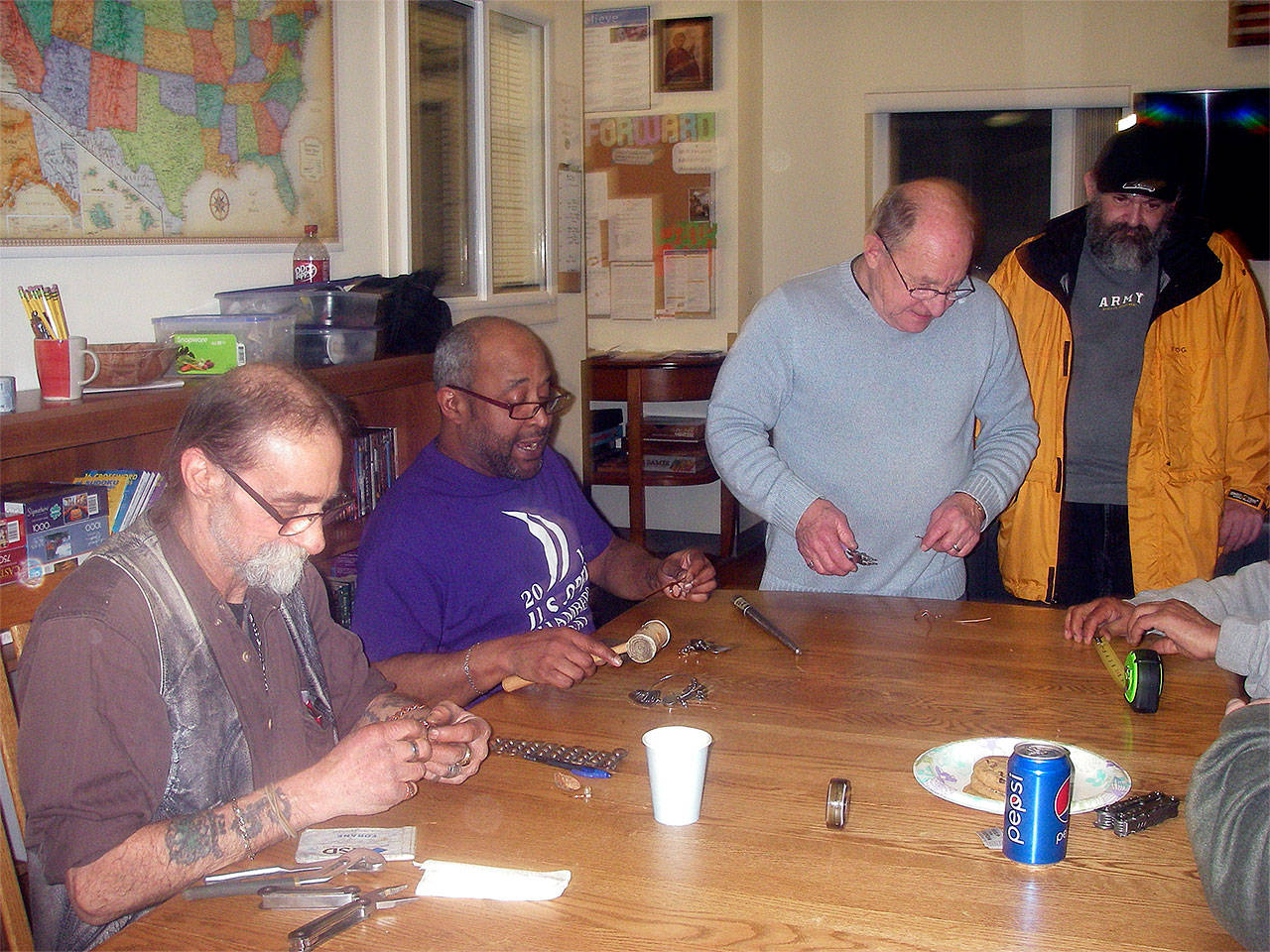 The Everett Elks sponsor a monthly event or activity at Sebastian Place, a residential apartment complex for previously homeless veterans. The March program included metal jewelry making. (Contributed photo)
