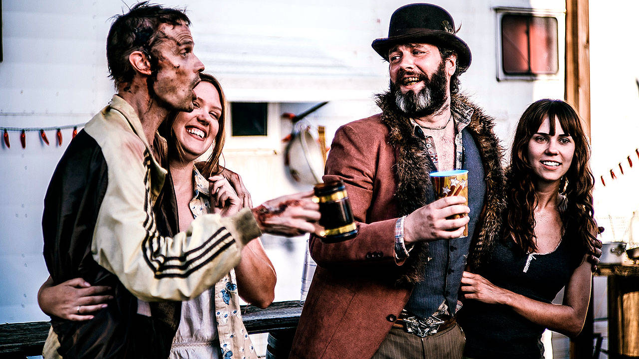 Doug Dawson (left) plays the character Skeezy, while Mark Carr (second from right) plays Sketchy, his partner in shenanigans on the Syfy show “Z Nation.” Marysville brewer R.J. Whitlow of 5 Rights Brewing brewed an American brown ale named in honor of Skeezy. (Syfy)