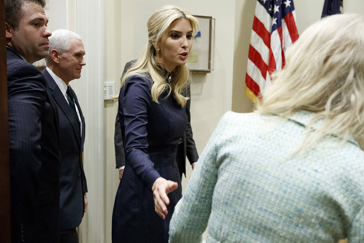 Ivanka Trump, followed by Vice President Mike Pence, arrives for a meeting with President Donald Trump about veterans affairs on Friday, March 17, in the Roosevelt Room of the White House in Washington. (AP Photo/Evan Vucci, file)