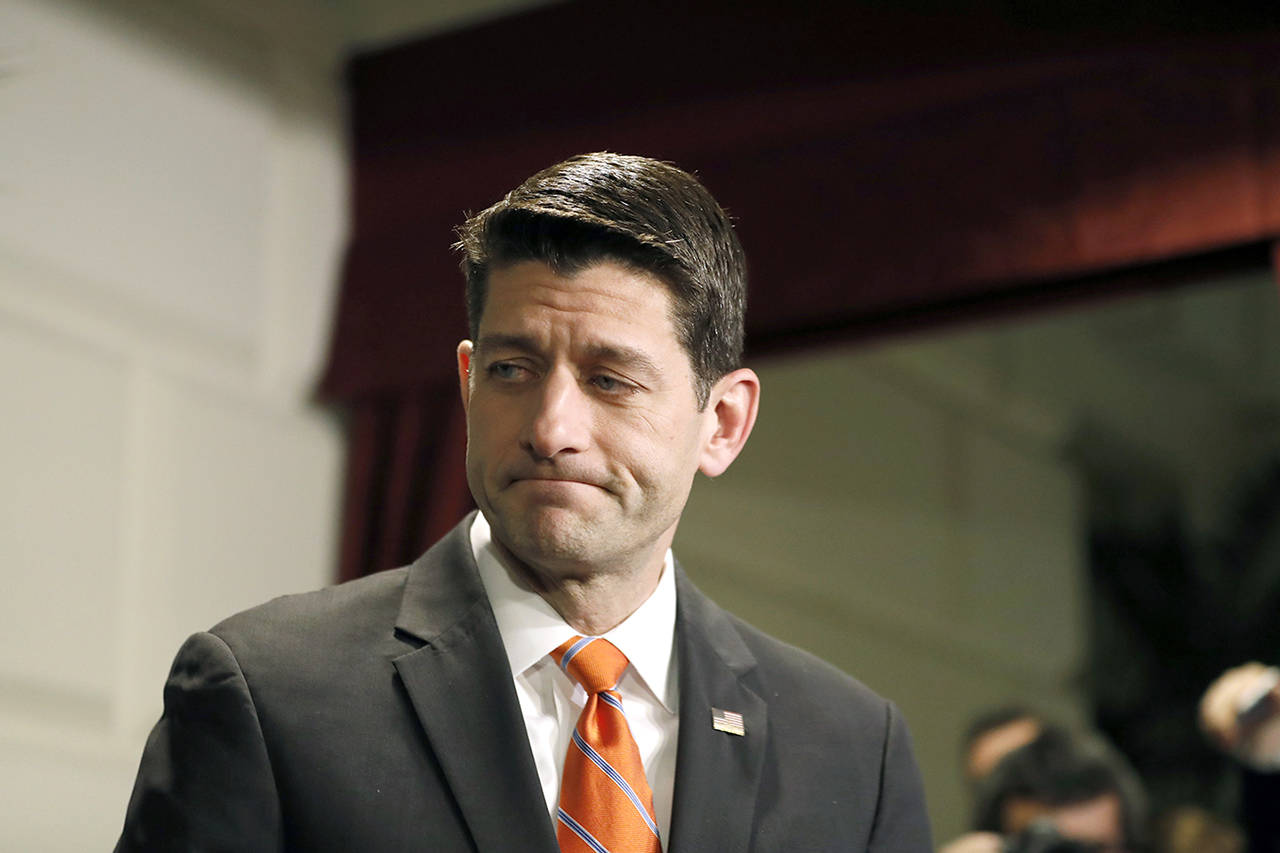 Speaker Paul Ryan of Wisconsin departs after speaking to the media after a Republican caucus meeting on Capitol Hill on Thursday, March 23, in Washington. (AP Photo/Alex Brandon)