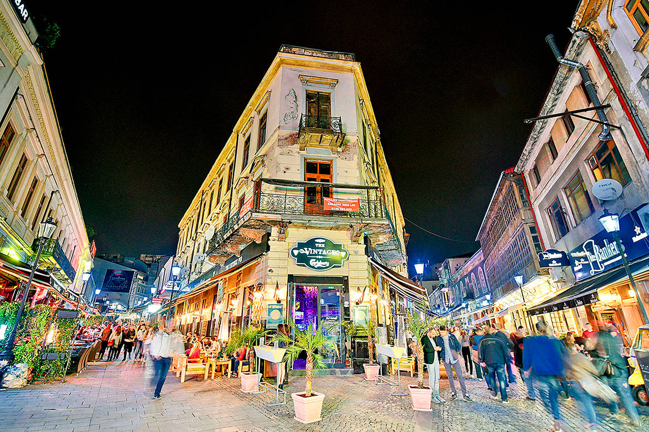 Bucharest’s Old Town after dark has a vibrant party vibe. (Photo by Rick Steves)