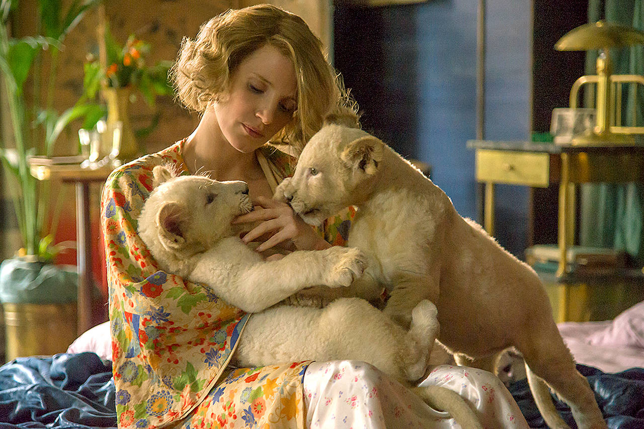 The story of the keepers of the Warsaw Zoo — Antonina (Jessica Chastain (above) and Jan Zabinski (Johan Heidenbergh), who helped save hundreds of people and animals during the German invasion is told in “The Zookeeper’s Wife.” (Anne Marie Fox/Focus Features via AP)