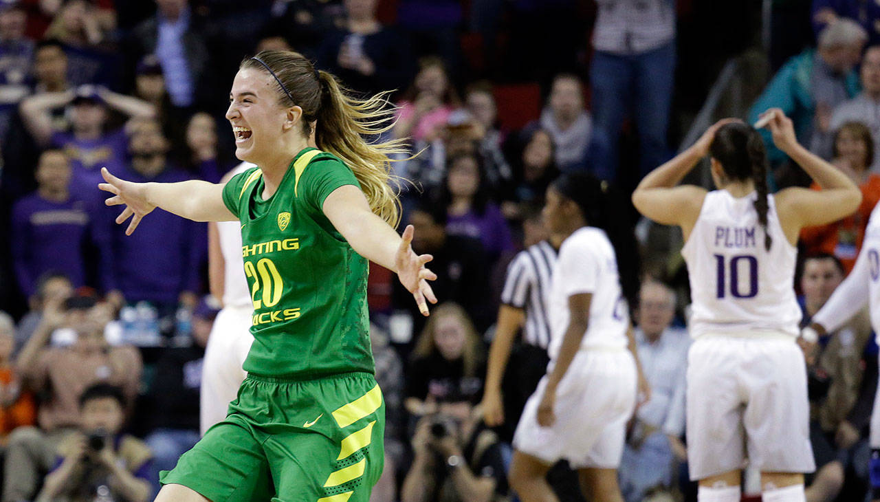 Oregon’s Sabrina Ionescu smiles after her team defeated Washington 70-69 in a Pac-12 tournament game on March 3, 2017, in Seattle. (AP Photo/Elaine Thompson)