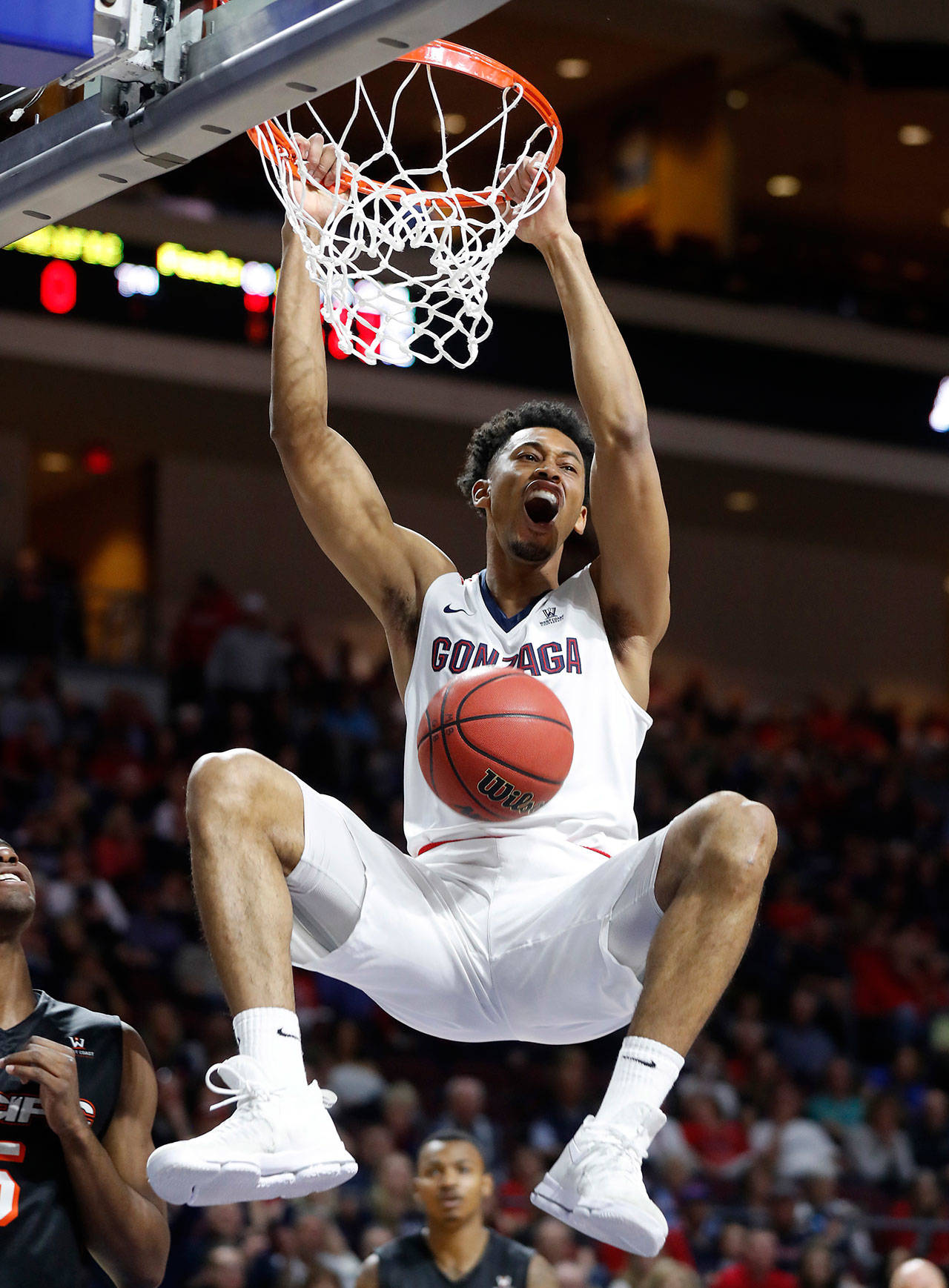 Gonzaga’s Johnathan Williams dunks during the first half of the team’s West Coast Conference tournament game against Pacific on March 4, 2017, in Las Vegas. (AP Photo/Isaac Brekken)