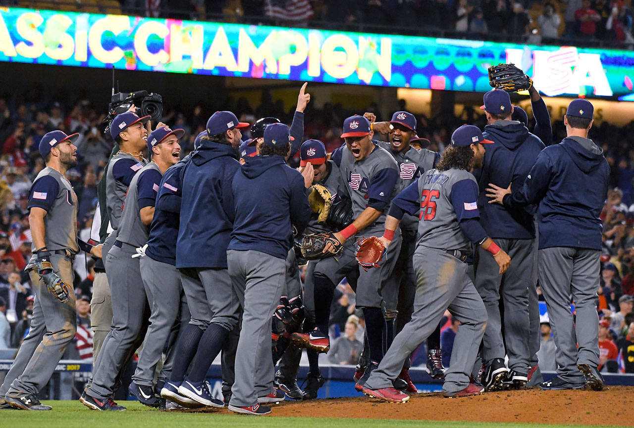 The U.S. team celebrates an 8-0 win over Puerto Rico in the final of the World Baseball Classic on March 22, 2017, in Los Angeles. (AP Photo/Mark J. Terrill)