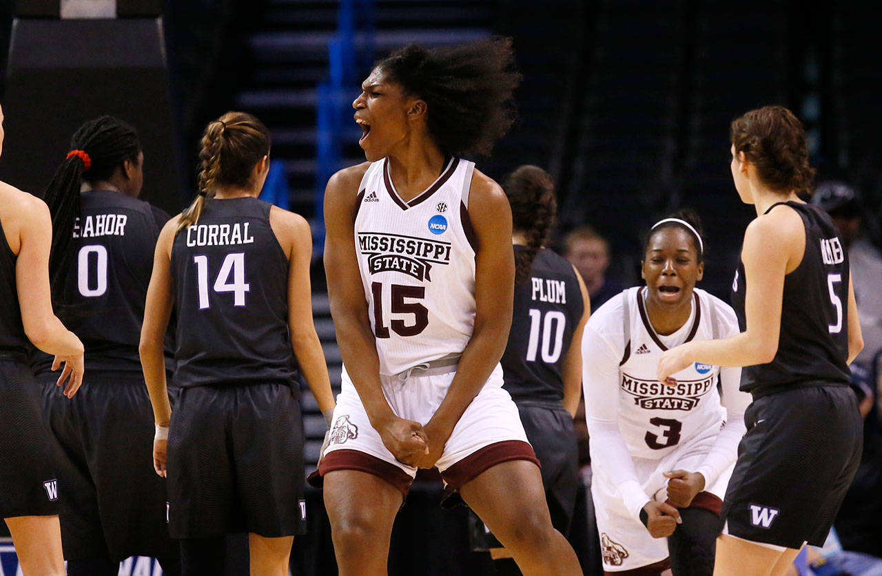 Mississippi State center Teaira McCowan (15) celebrates during the second half of an NCAA Tournament regional semifinal against Washington on March 24, 2017, in Oklahoma City. (AP Photo/Sue Ogrocki)