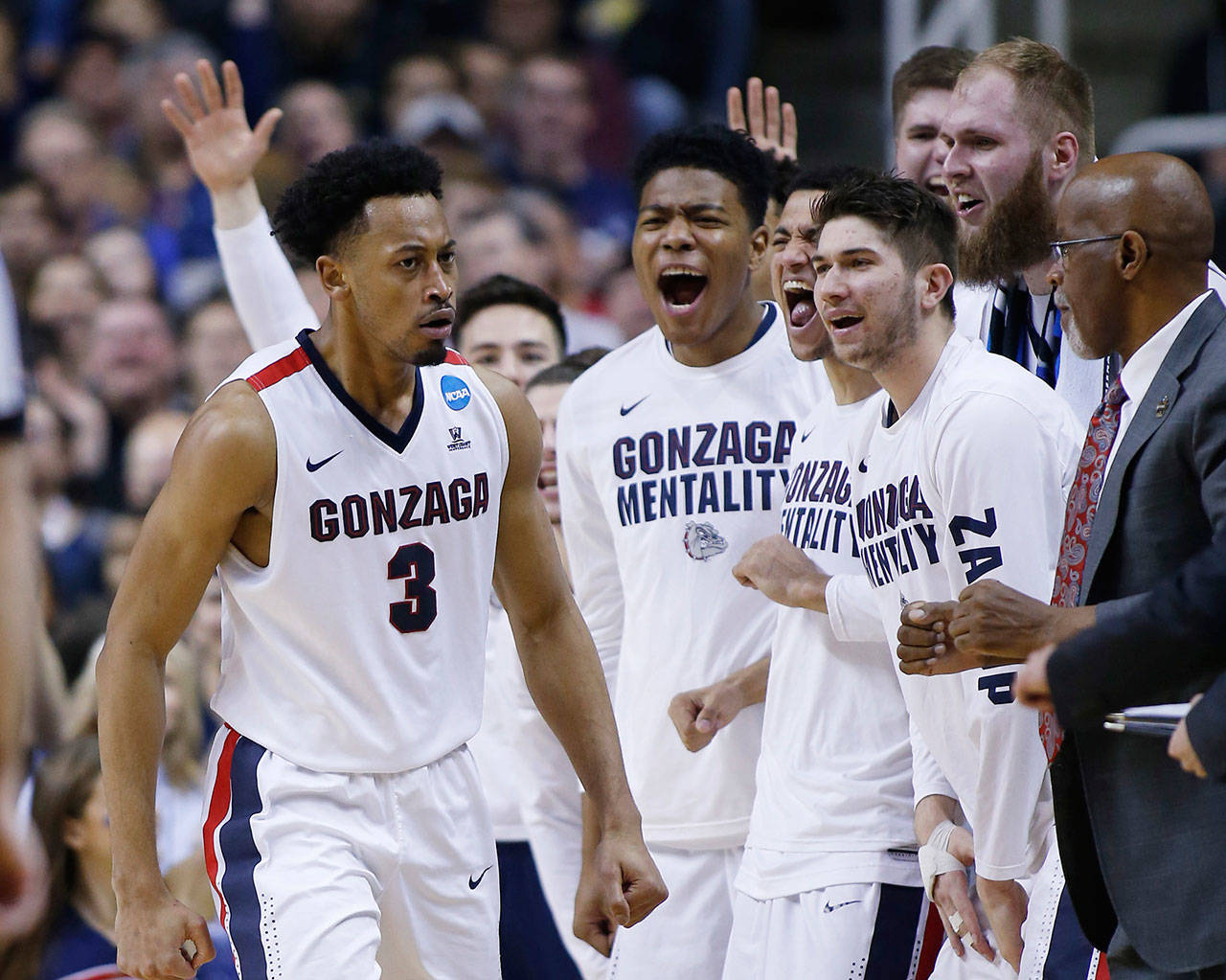 Gonzaga forward Johnathan Williams (3) celebrates with teammates after dunking against Xavier during the second half of an Elite Eight game on March 25, 2017, in San Jose, Calif. (AP Photo/Tony Avelar)