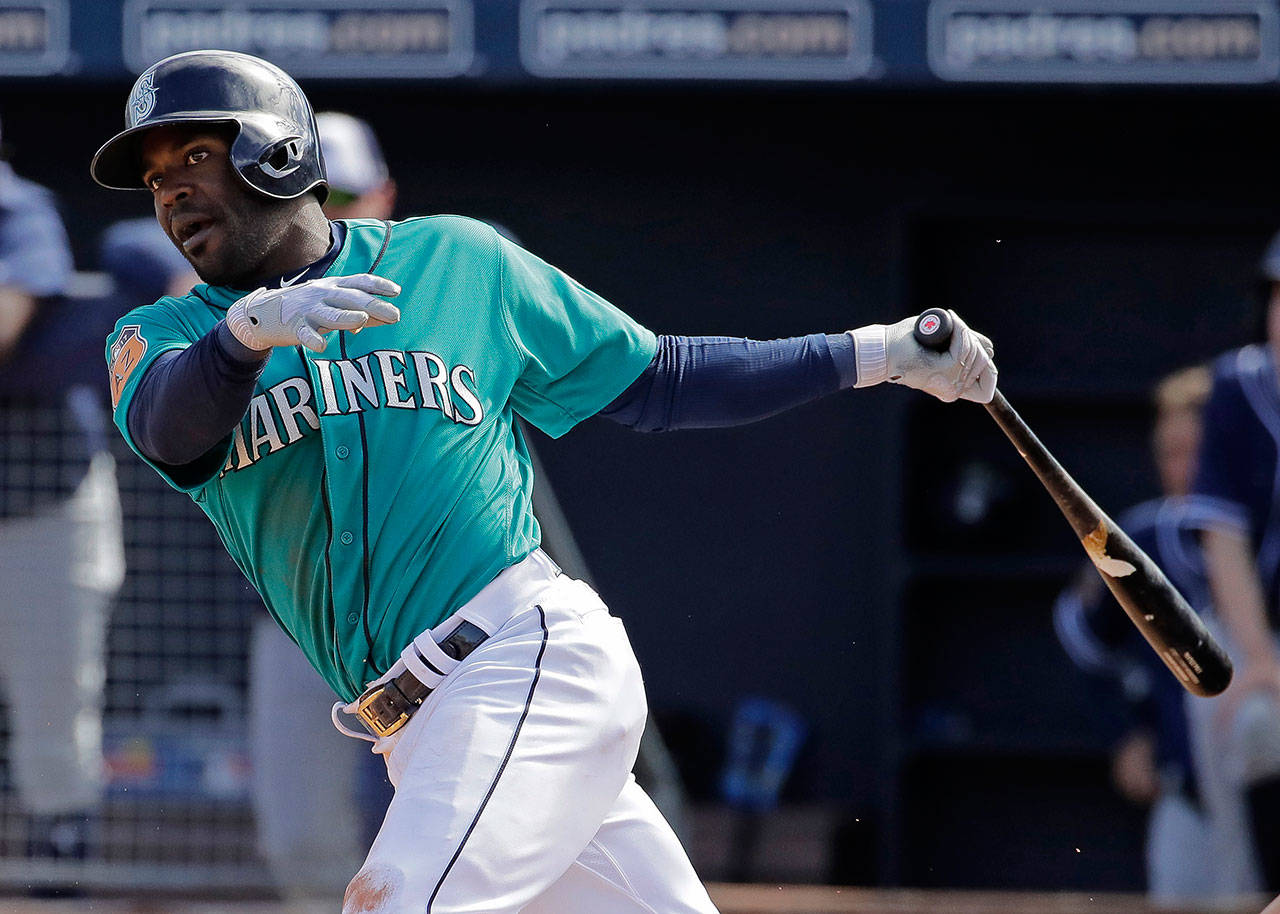 The Mariners’ Guillermo Heredia bats during the third inning of a spring training game against the Padres on Feb. 26, 2017, in Peoria, Ariz. (AP Photo/Charlie Riedel)