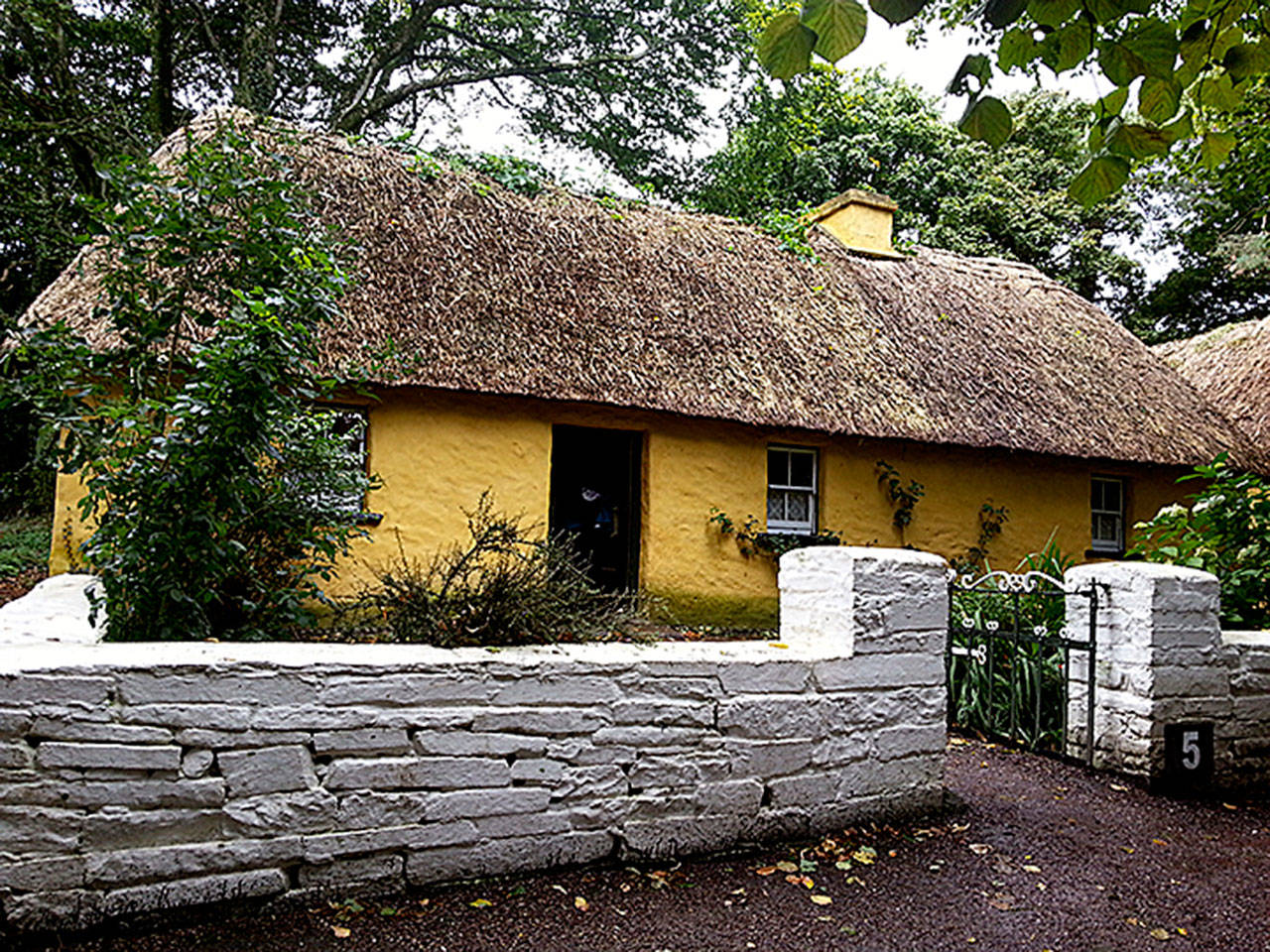 A thatched cottage and garden, like this one in Bunratty, County Clare, is a symbol of Ireland. (Sandra Schumacher photo)