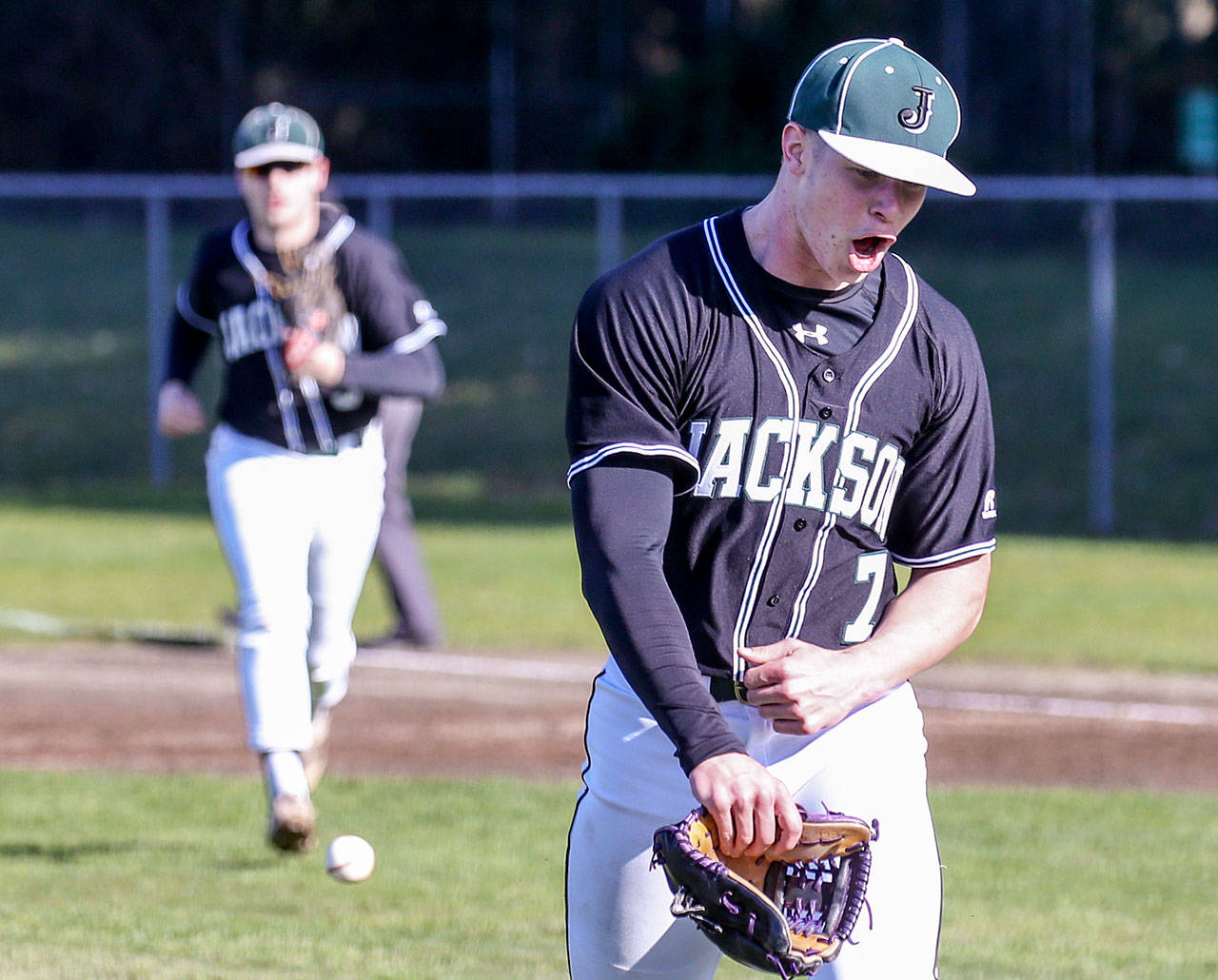 Jackson pitcher Jacob Bogacz celebrates a strikeout as he makes his way to the dugout during a game against Glacier Peak on March 30, 2017, at Jackson High School in Mill Creek. (Kevin Clark / The Herald)