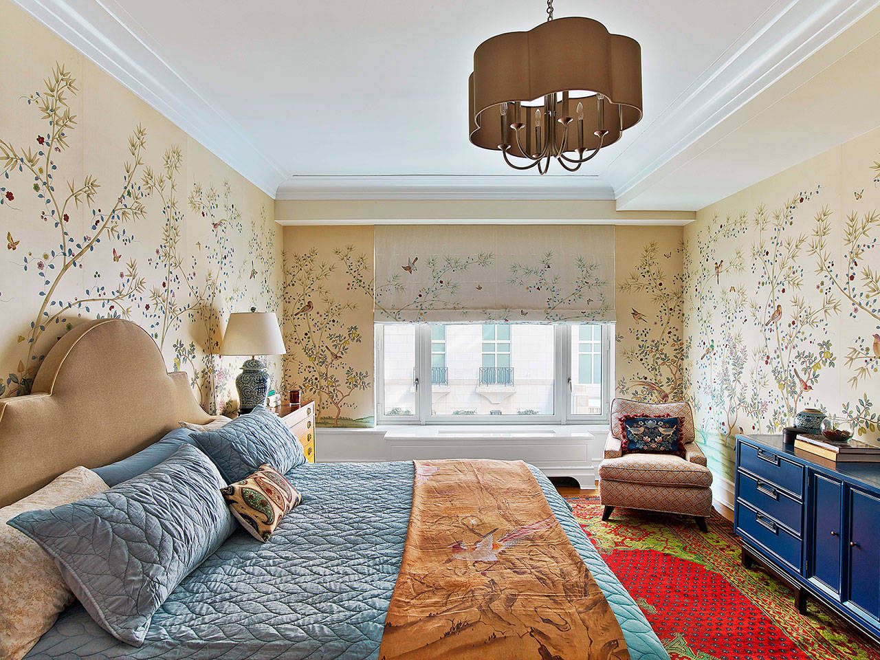 Designer Kati Curtis says the renewed interest in wallpapers, such as the botanical Fromental paper she used in this project, is in part a backlash to the “sterile grays-whites-neutrals” of the ’90s and early aughts, and the more recent obsession with the layered rugs and clustered collectibles of the California bohemian aesthetic. (Photo by Eric Laignel)