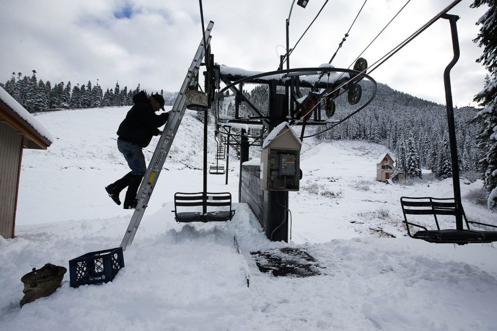 Ian Terry / The Herald Bruce Albert does some routine maintenance on Kehr’s Chair at Stevens Pass on Thursday, Nov. 17. "This heavier snow helps keep the brush down," Albert said of the fresh snow that’s fallen at higher altitudes in the Cascade Mountains during the past few days. Photo taken on 11172016
