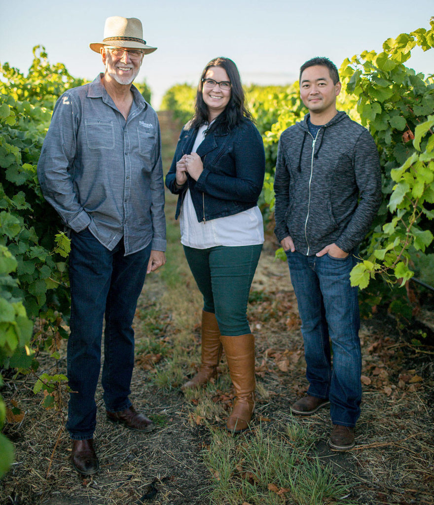 Butch Milbrandt, owner of Milbrandt Family Wines, oversees Milbrandt Vineyards winemaker Emily Haines and Ryan Patrick winemaker Jeremy Santo. (Photo courtesy of Milbrandt Family Vineyards)
