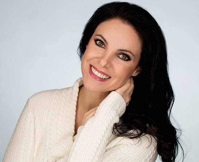 Laura Hunter, a Snohomish County resident with a business in Everett, discovered that she was the unwitting face of a fake-news website and is suing the registered owners. (Contributed photo)