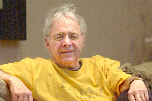 Chuck Barris, the man behind TV’s “The Dating Game,” poses in the lobby of his apartment in New York in 2002. (Associated Press)