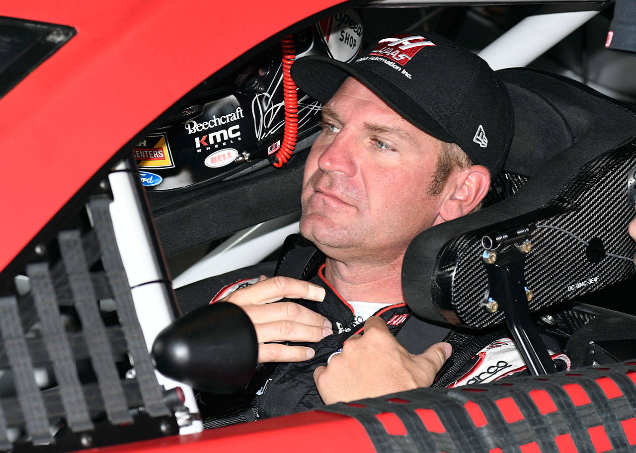 Clint Bowyer sits in his car during a practice session for Sunday’s NASCAR Cup Series race at Texas Motor Speedway in Fort Worth, Texas on Saturday. Bowyer has enjoyed a career revival with a move to Stewart-Haas Racing. (AP Photo/Larry Papke)
