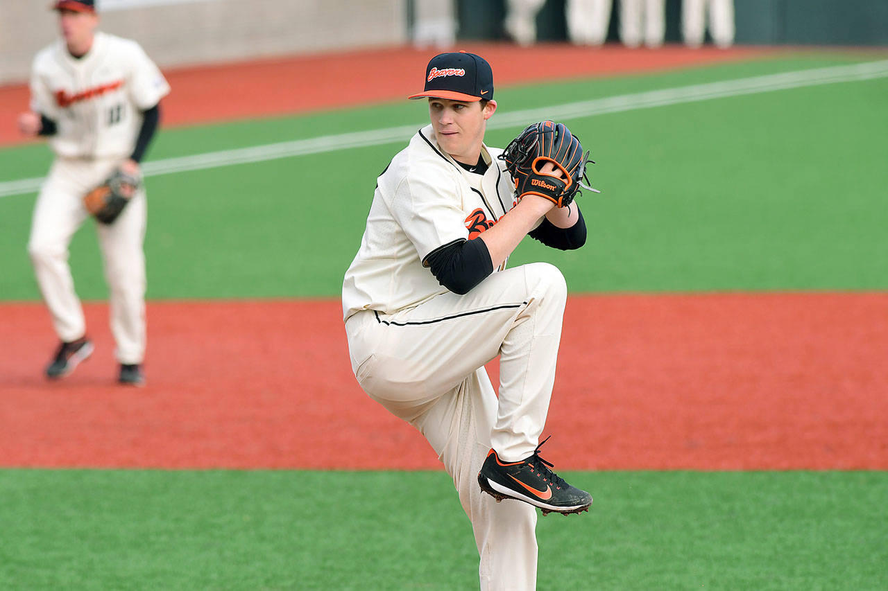 Oregon State’s Jake Mulholland delivers during a game this season at Goss Stadium in Corvallis, Oregon. Mulholland, a freshman left-hander from Snohomish, has helped the Beavers to a No. 1 overall ranking in both major polls entering the weekend. (Dave Nishitani / Oregon State athletics)
