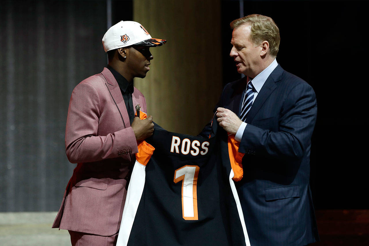 John Ross greets NFL commissioner Roger Goodell on Thursday after being selected by the Cincinnati Bengals during the first round of the 2017 NFL draft in Philadelphia. (AP Photo/Matt Rourke)