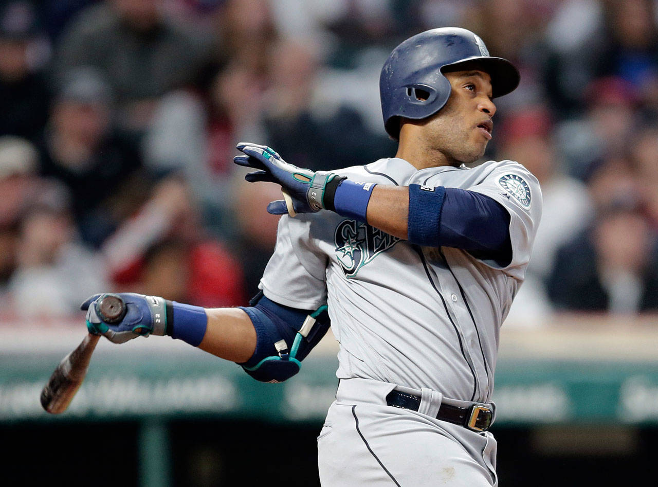 Seattle’s Robinson Cano watches his two-run home run during the fourth inning of Friday’s game in Cleveland. (AP Photo/Tony Dejak)
