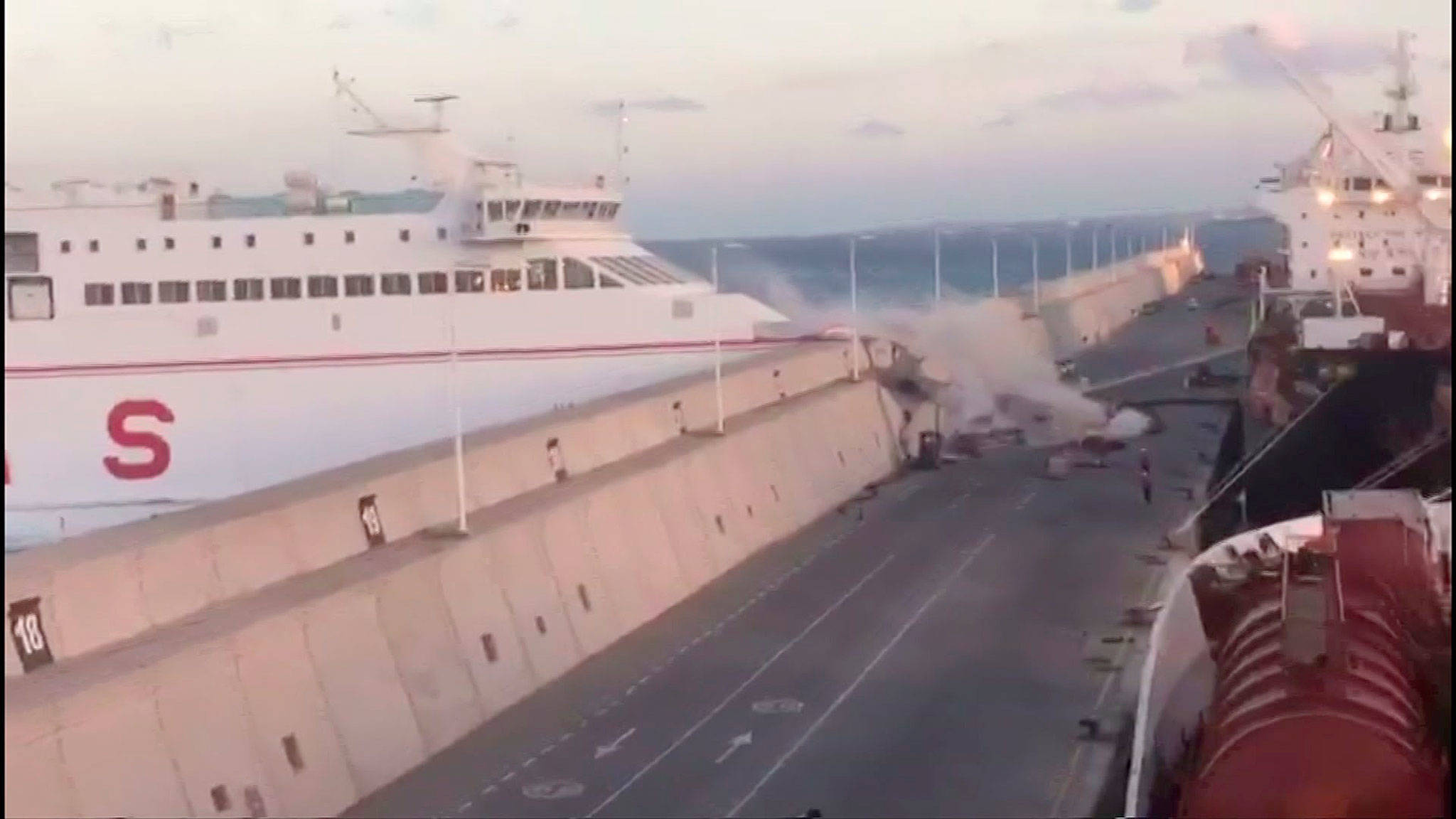 A Naviera Armas ferry hits the breakwater at Puerta de la Luz, Gran Canaria, Spain on Friday. (EMERGCAN)