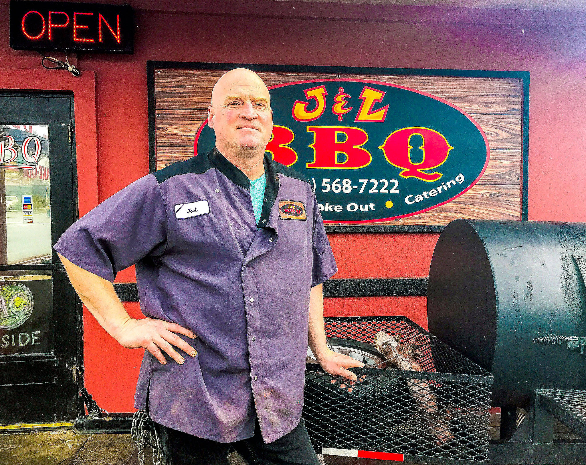 Joel Sexton, owner of J&L BBQ, at his Snohomish restaurant. He opened a second location in downtown Everett this week. (Andrea Brown / The Herald)