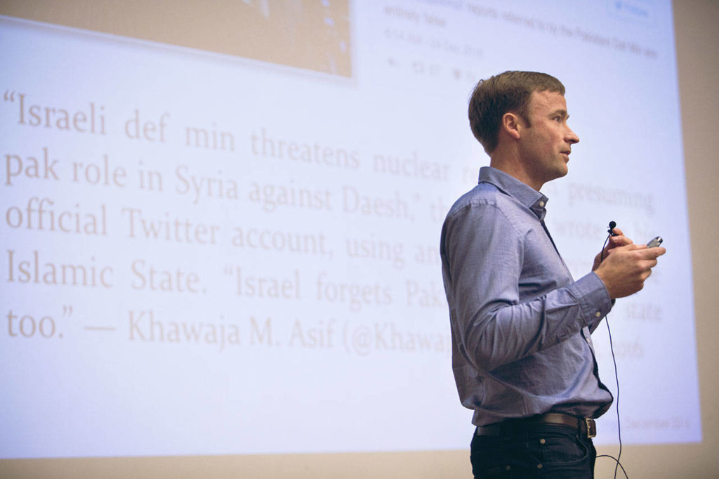 Jevin West, a professor in the Information School at the University of Washington, addresses students on the first day of the class “Calling Bullshit in the Age of Big Data.”​ (Quinn Russell Brown for The Herald)
