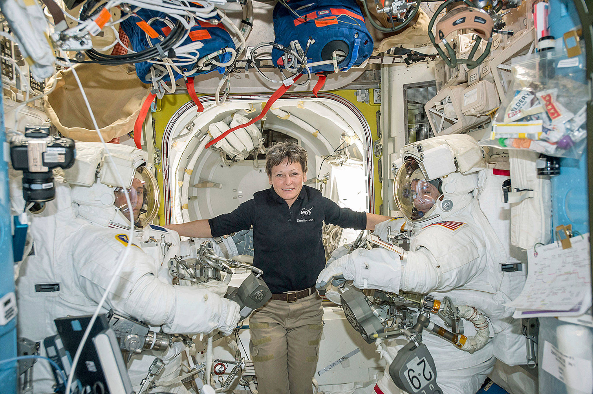 Astronaut Peggy Whitson (center) floats inside the International Space Station with Thomas Pesquet (left) and Shane Kimbrough before their spacewalk in January. Early Monday, space station commander surpassed the 534-day, two-hour-and-48-minute record set last year by Jeffrey Williams for most accumulated time in orbit by an American.(NASA via AP, File)