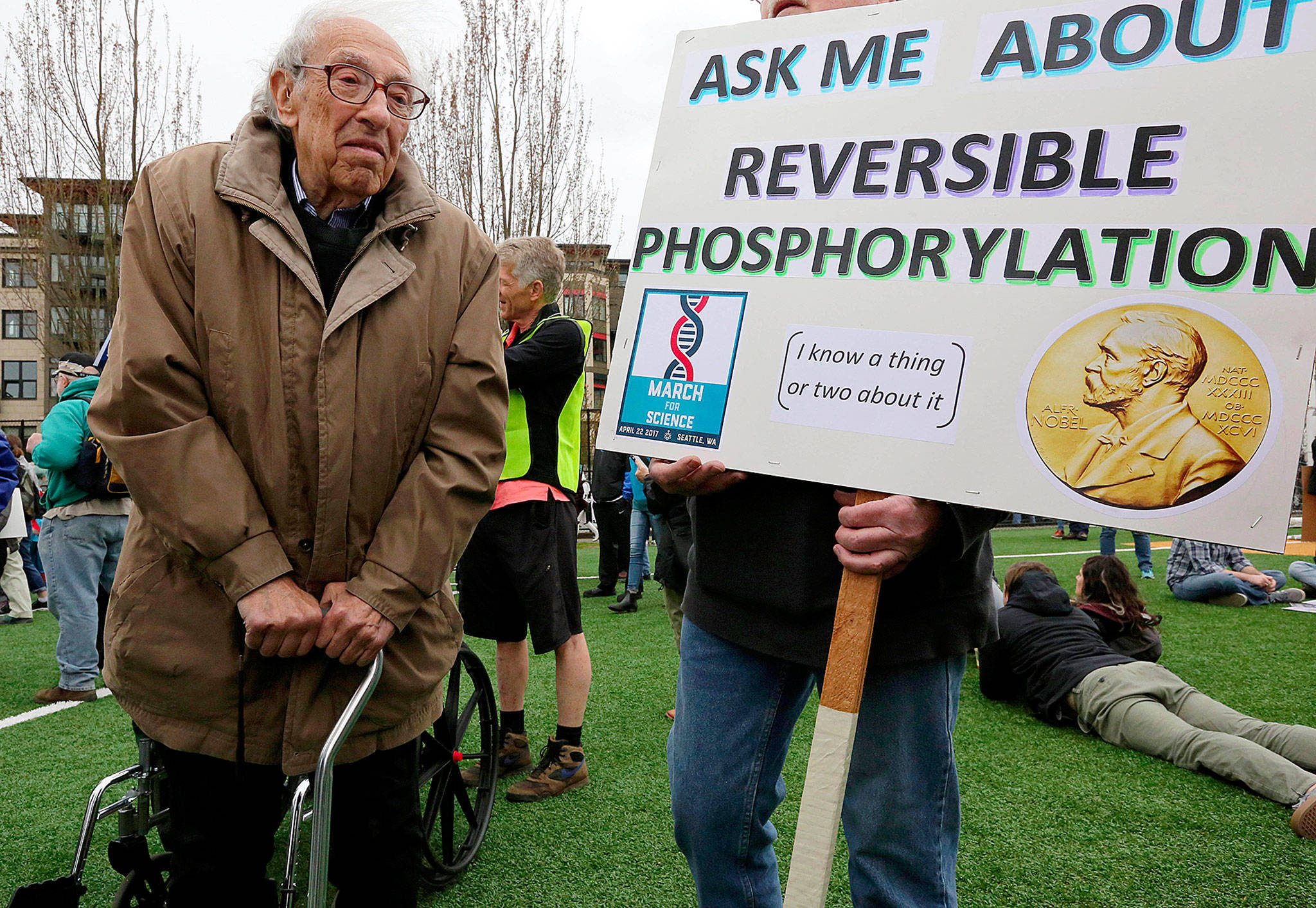 Nobel Laureate Eddy Fischer, professor emeritus of biochemistry at the University of Washington, attends the March for Science in Seattle on Saturday. (Alan Berner/The Seattle Times)