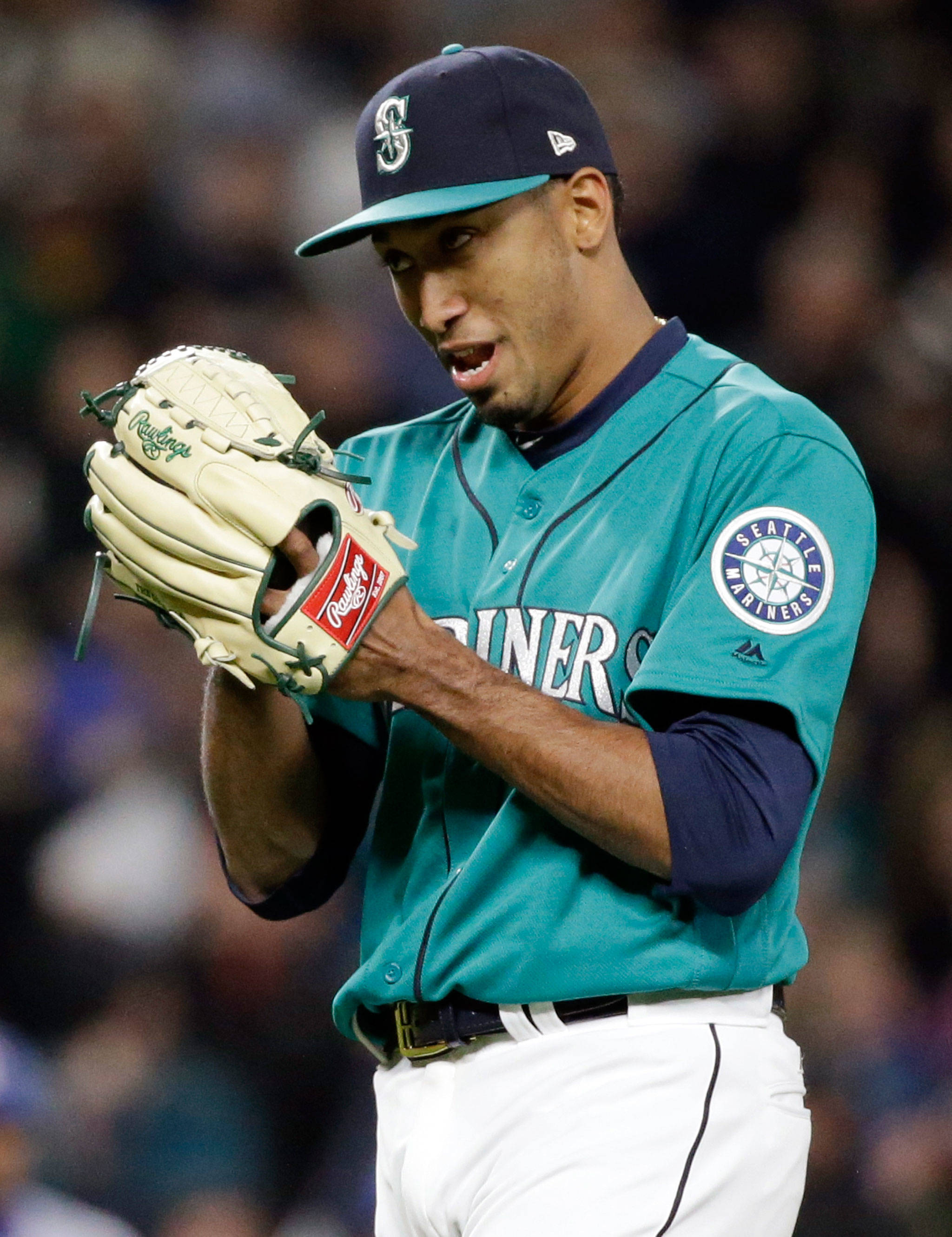 Seattle closer Edwin Diaz reacts to the final out of the Mariners’ 2-1 win over the Texas Rangers on April 14 in Seattle. (AP Photo/Elaine Thompson)