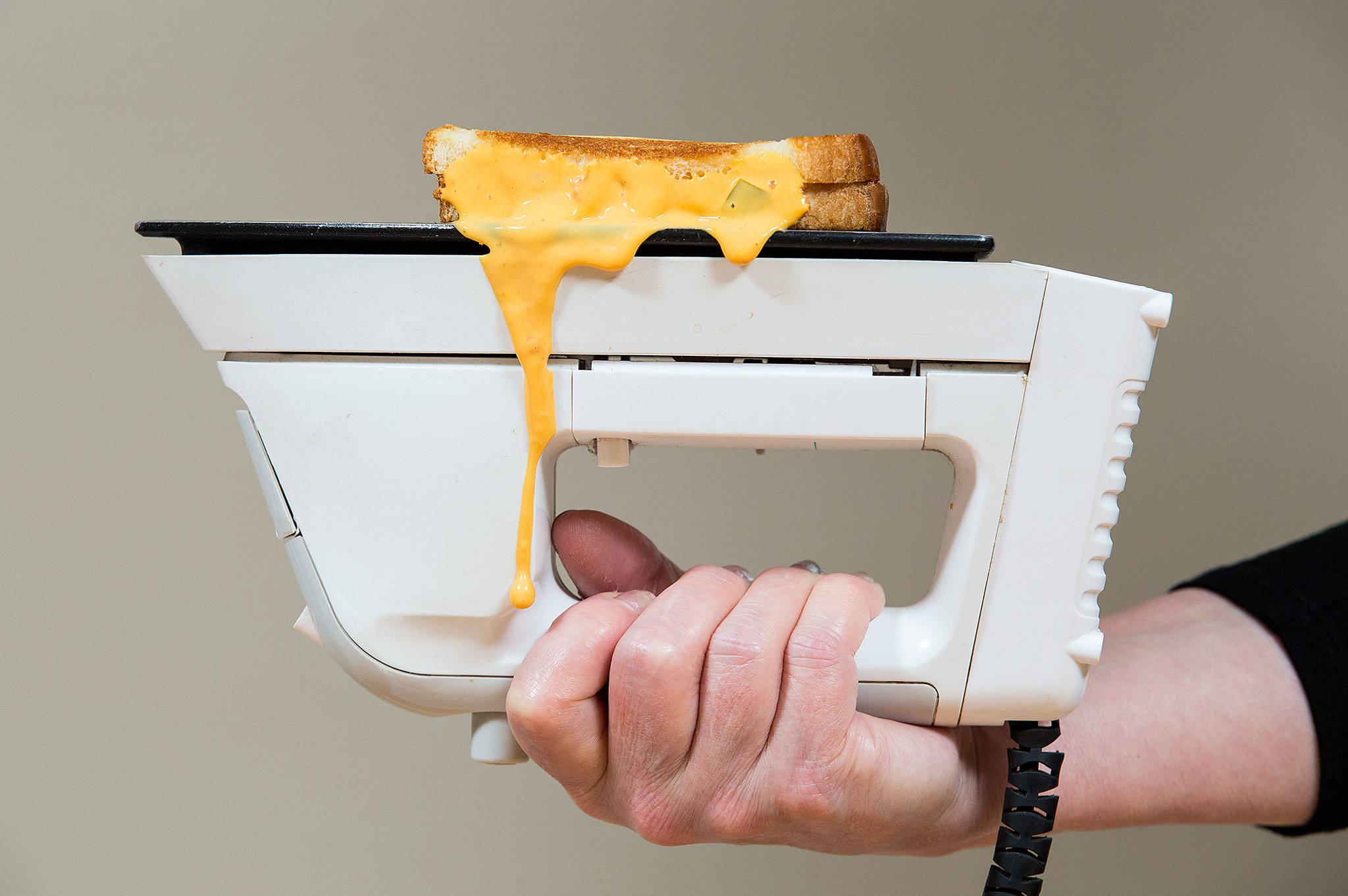 Don’t try this at home: A clothes iron can be used to make a great grilled cheese sandwich, but it’s advisable to wrap the sandwich in foil to avoid a mess. (Andy Bronson / The Herald)