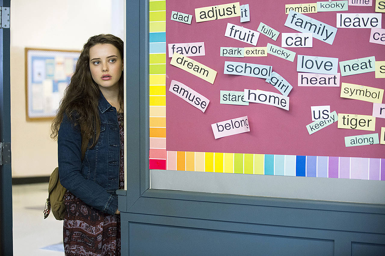 This image shows Katherine Langford in a scene from the series, “13 Reasons Why,” about a teenager who commits suicide. (Beth Dubber/Netflix via AP)
