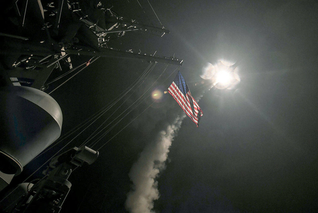 The guided-missile destroyer USS Porter (DDG 78) launches a tomahawk land attack missile in the Mediterranean Sea on Friday. (Mass Communication Specialist 3rd Class Ford Williams/U.S. Navy via AP)
