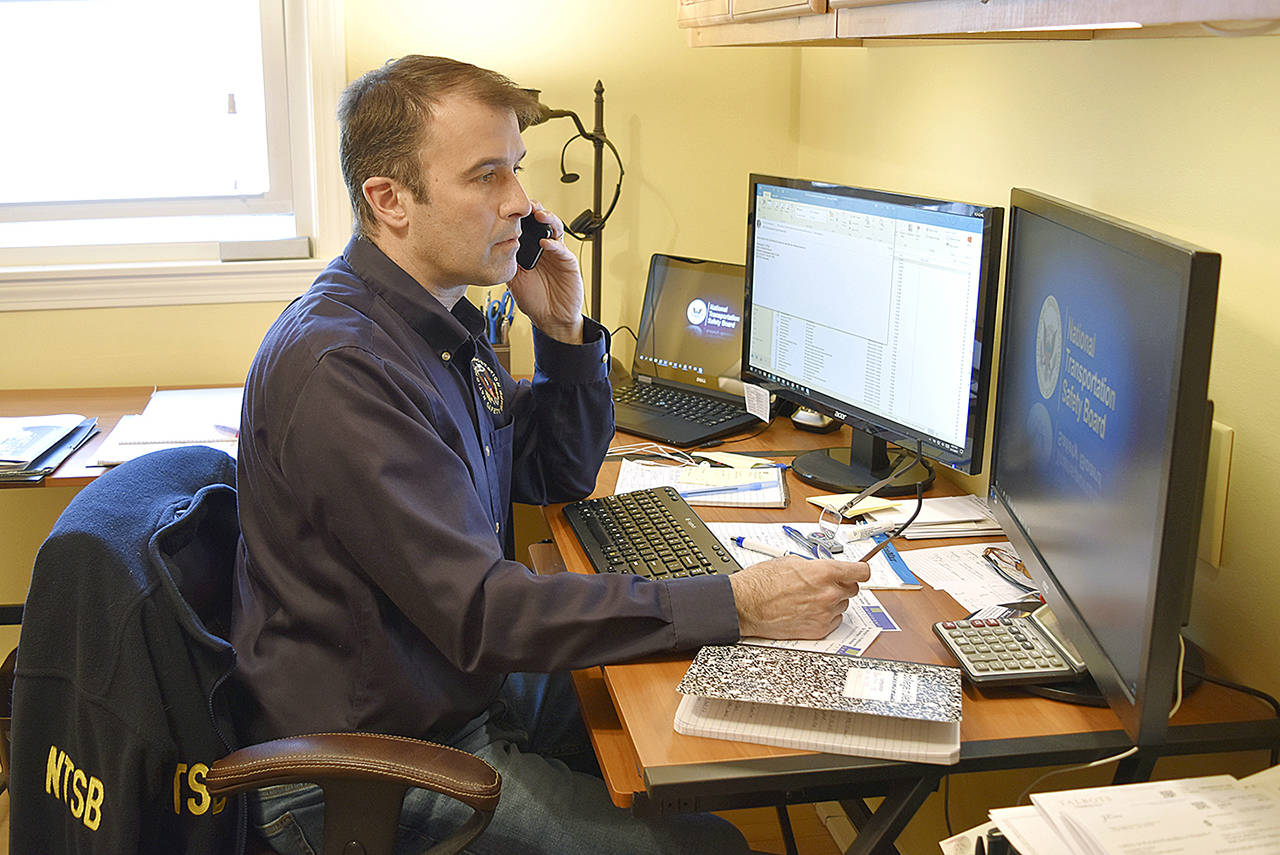 This April 11, 2017 photo shows investigator Brian Young at an undisclosed location. (NTSB via AP)