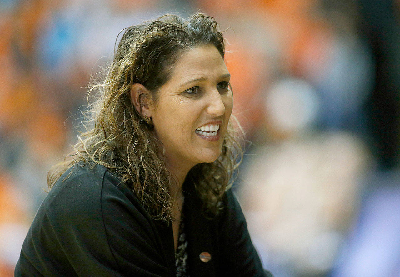 As Long Beach State head coach, Jody Wynn watches during the women’s NCAA college basketball tournament in Corvallis, Oregon. Washington has hired Wynn as the women’s basketball coach to replace Mike Neighbors.(AP Photo/ Timothy J. Gonzalez, File)
