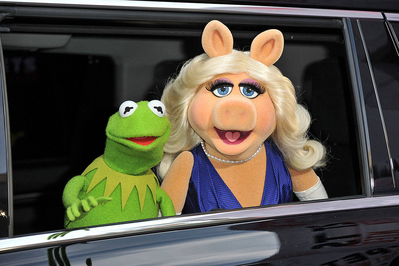Kermit the Frog and Miss Piggy arrive at the World Premiere of “Muppets Most Wanted” in Los Angeles in 2014. (AP file)