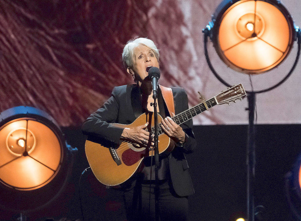 Inductee Joan Baez performs Friday. (Charles Sykes/Invision)
