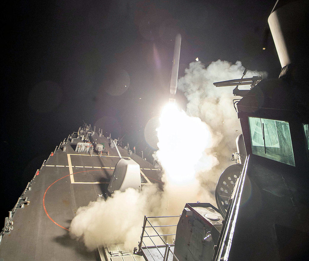 The USS Ross (DDG 71) fires a Tomahawk land attack missile Friday from the Mediterranean Sea. (U.S. Navy)
