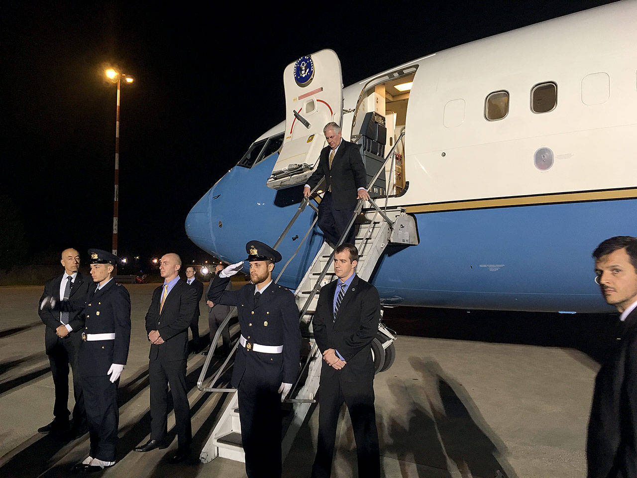 U.S. Secretary of State Rex Tillerson steps off his plane at Pisa Military Airport in Pisa, Italy, on Sunday. (AP Photo/Josh Lederman)