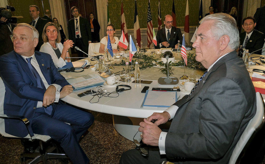 U.S. Secretary of State Rex Tillerson (right) at a table during a meeting of G7 foreign ministers in Lucca, Italy, on Tuesday. (Riccardo Dalle Luche/ANSA via AP) 
