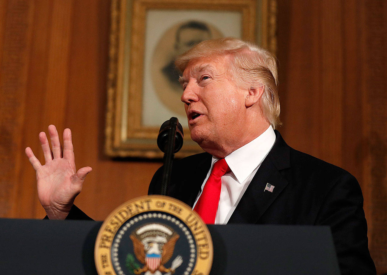 President Donald Trump speaks in Washington on Wednesday. The president is proposing dramatically reducing the taxes paid by corporations big and small in an overhaul his administration says will spur economic growth and bring jobs and prosperity to the middle class. (AP Photo/Carolyn Kaster)