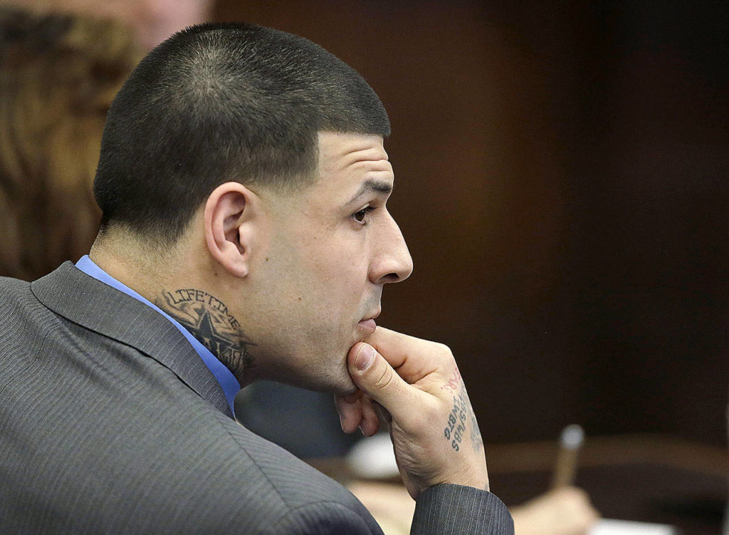 Former New England Patriots tight end Aaron Hernandez attends his double murder trial during the sixth day of jury deliberations at Suffolk Superior Court on Friday, April 14, in Boston. (AP Photo/Stephan Savoia, Pool)
