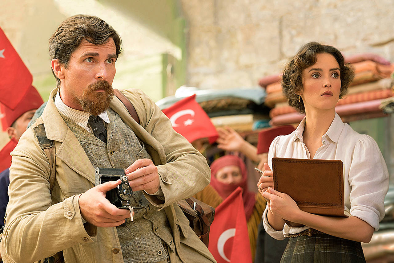 Charlotte Le Bon and Christian Bale are part of a love triangle set during the last days of the Ottoman Empire in “The Promise.” (Jose Haro/Open Road Films via AP)